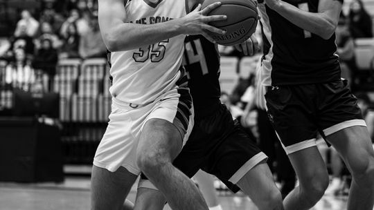 Chanute splits first two in Ralph Miller