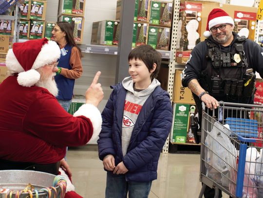 Chanute Rotary celebrates first year of Shop With a Cop