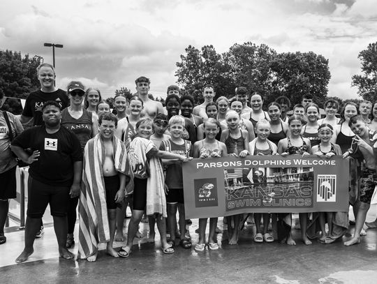 Sharks travel for KU swim clinic