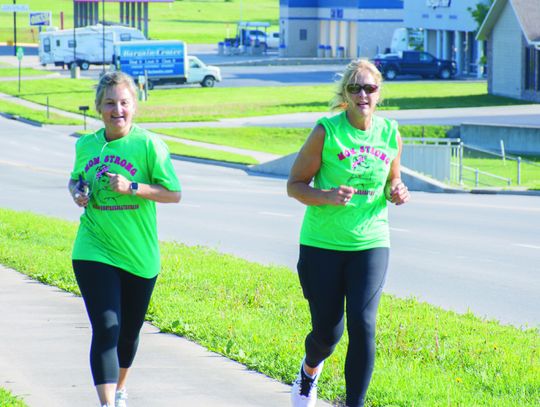 Two participants run near Santa Fe Park during the third annual Chanute Mother’s Two participants run near Santa Fe Park during the third annual Chanute Mother’s
