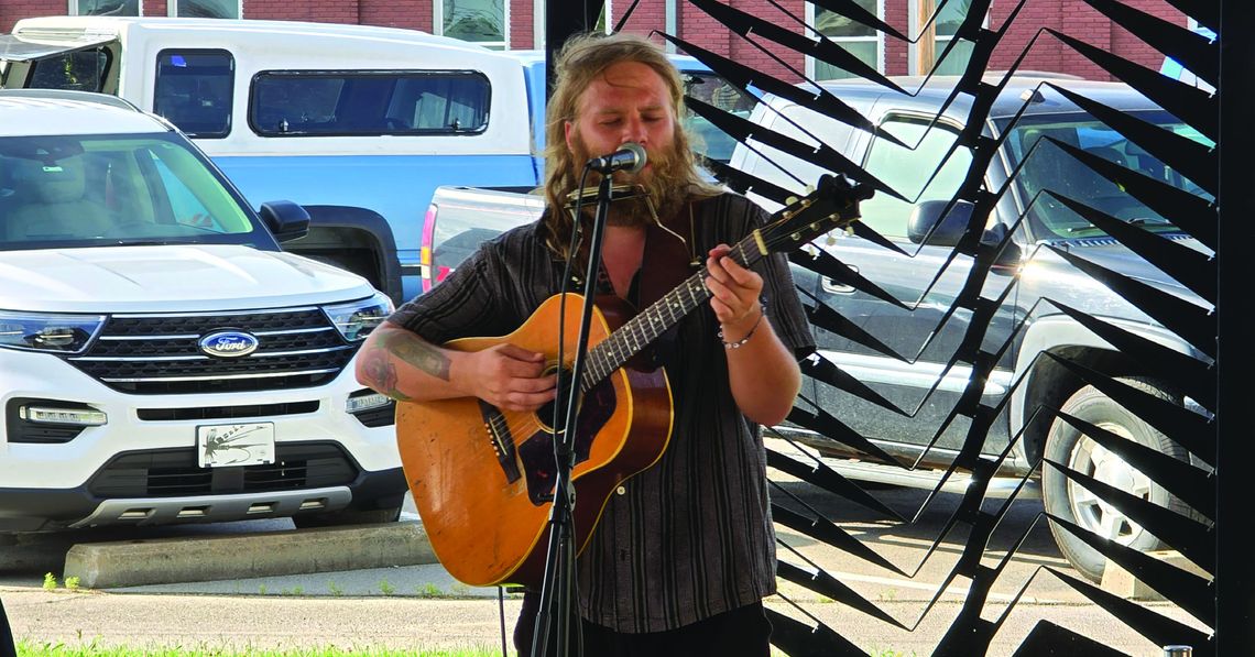 Award winning blues artist Joe Waters performed during the Main Street Chanute Farmers Market