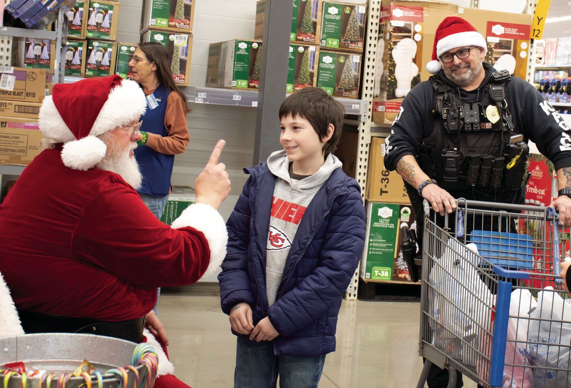 Chanute Rotary celebrates first year of Shop With a Cop