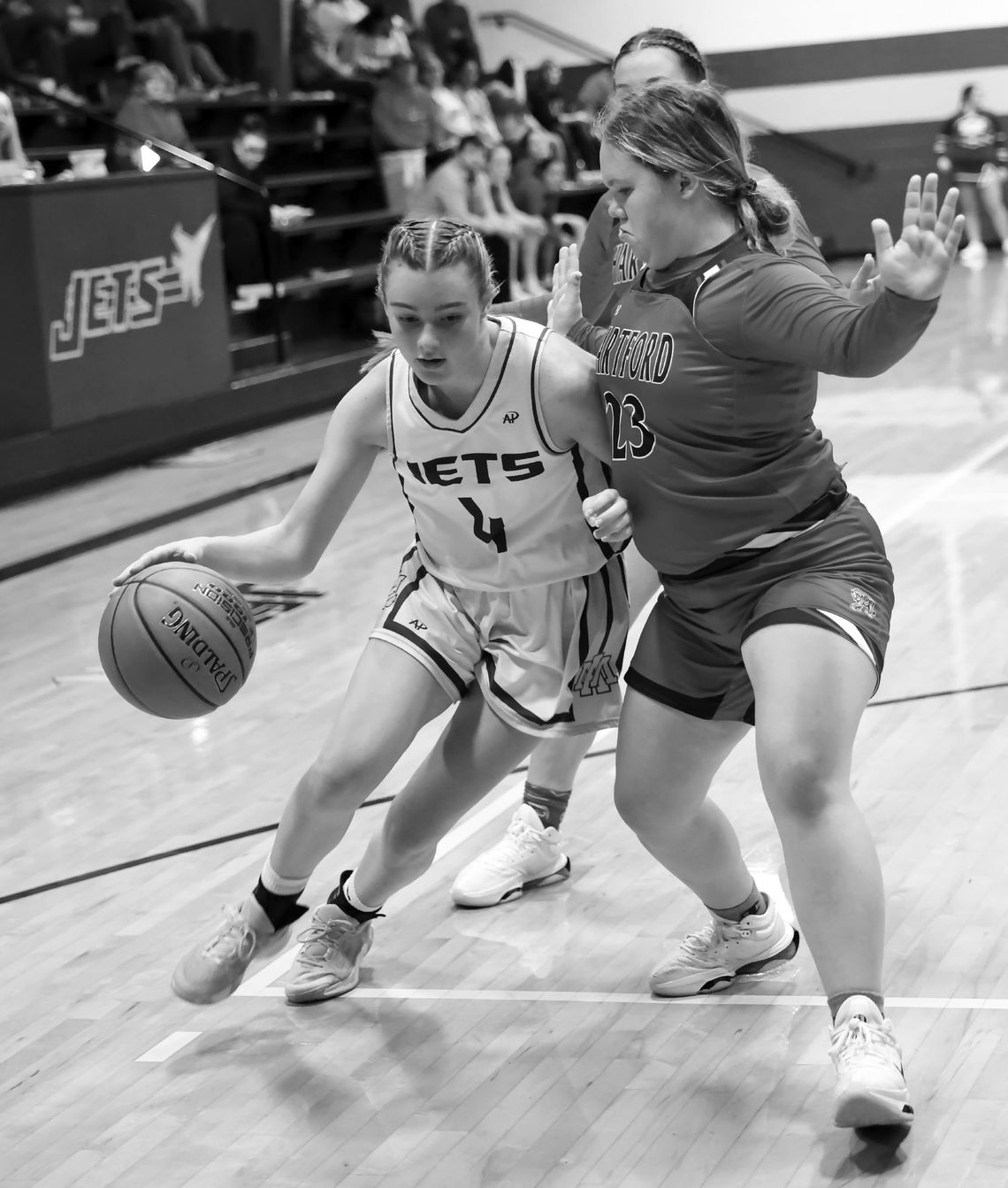 Jets grounded by Hartford in hoops opener